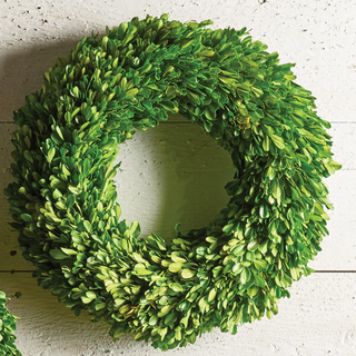 This is 16" real English boxwood is wreath preserved and handcrafted leaf by leaf. It is beautiful and looks gorgeous on a table as a centerpiece, on a mantel, or on the door of a covered patio. Details:
Dimensions: 16" in diameter and 2.75" D
Material: Preserved Boxwood, Third & Main, Floral, Boxwood, Wreath