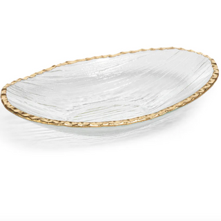 A clear glass decorative bowl that has a wavy rim.  Dimensions 11.5 in x 7.5 in x 2.5 in